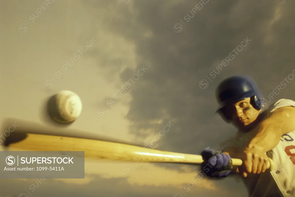 Baseball player swinging a bat