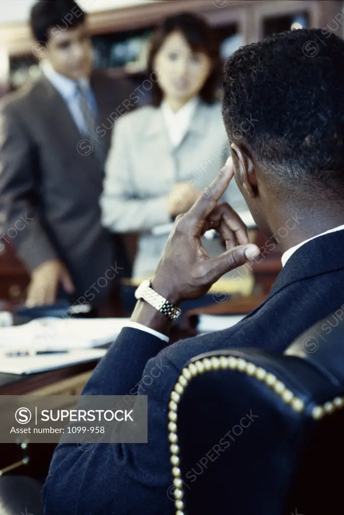 Rear view of a businessman in an office