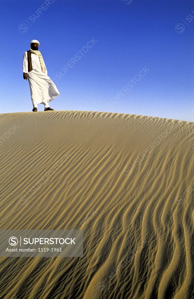 Man standing in a desert, Siwa Oasis, Egypt