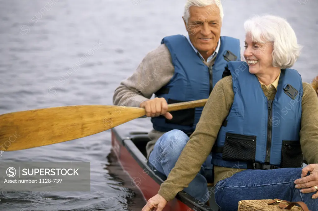 Senior couple in a row boat