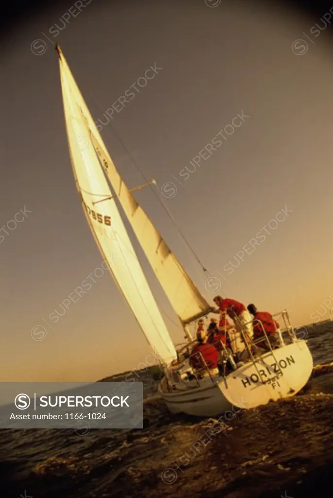 Group of people sailing on a sailboat