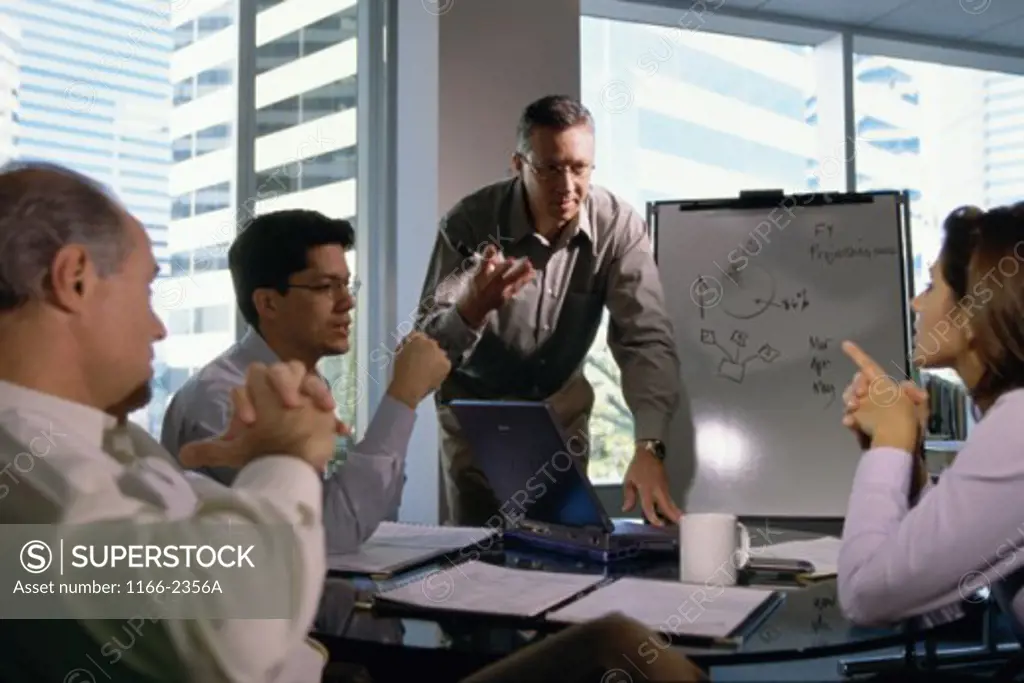 Businessman giving a presentation in a meeting