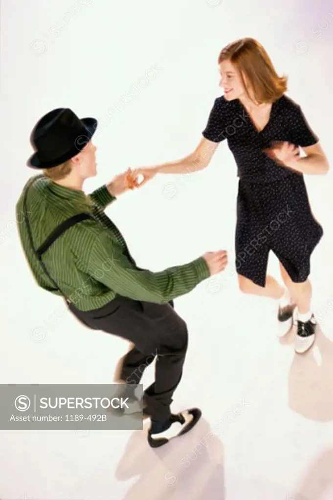 High angle view of a young couple dancing in a nightclub