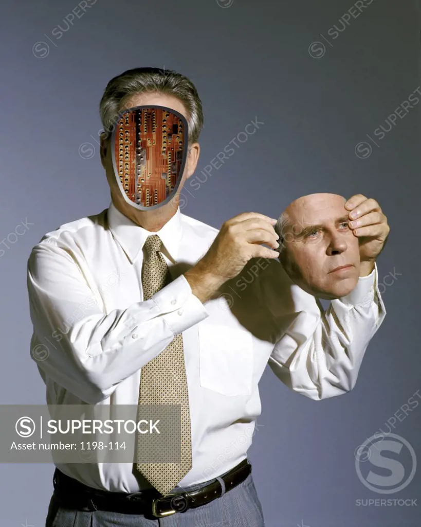 Businessman holding his face