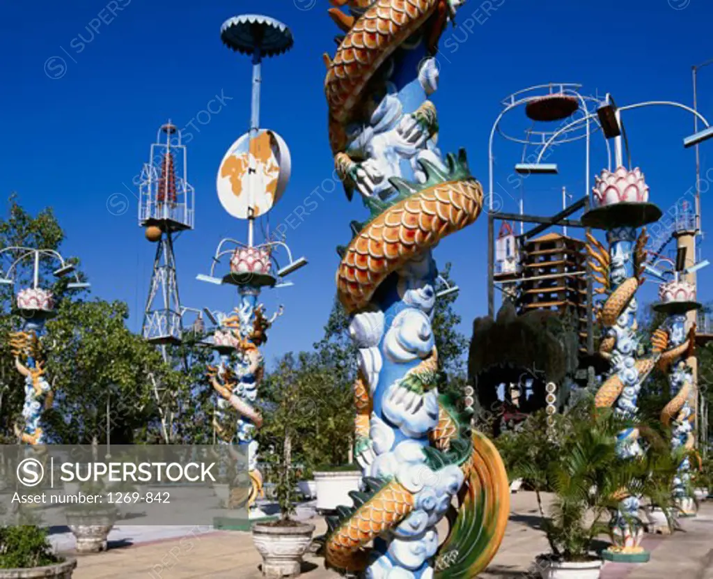 Sculptures of Chinese dragons at a temple, Temple of the Coconut Monk, Phung Island, Vietnam