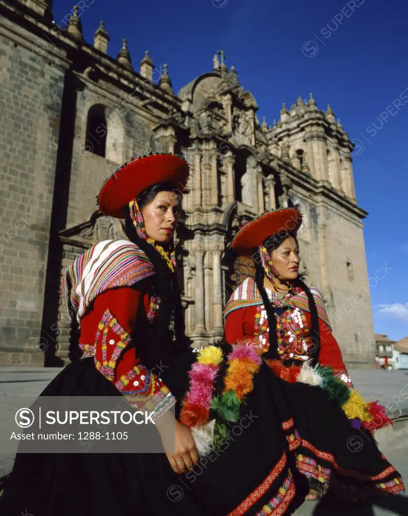 Two young women wearing traditional clothing, Cuzco, Peru