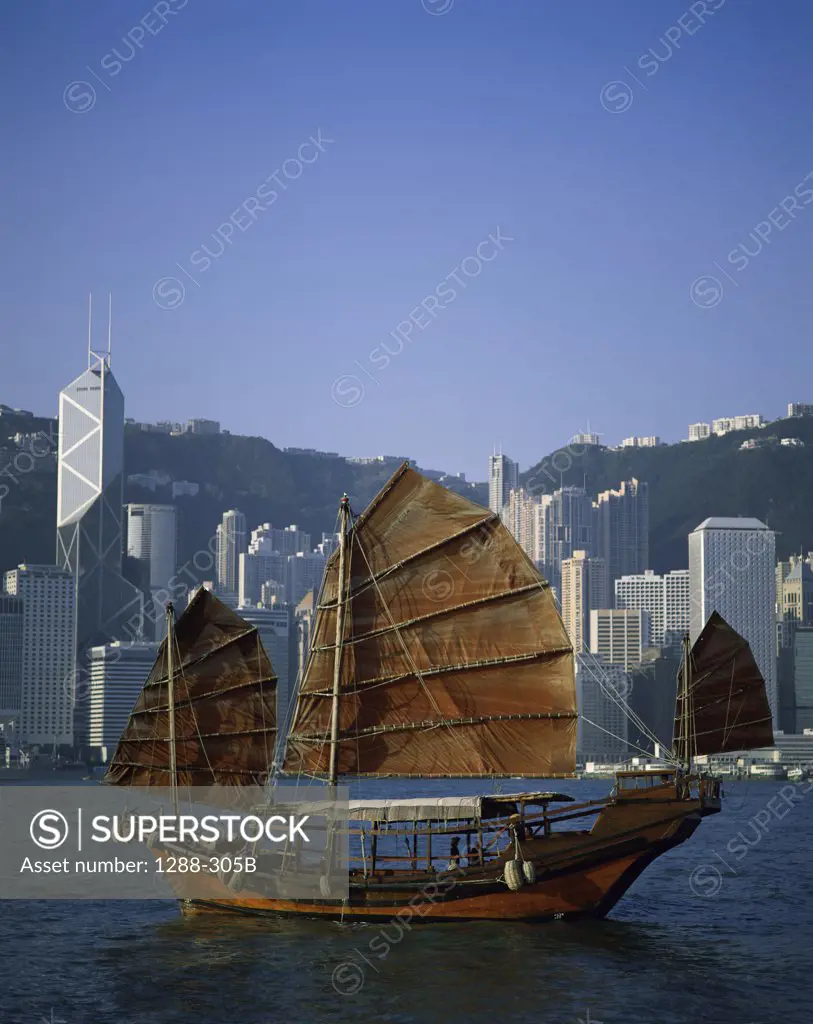 Chinese junk sailing in the sea, Hong Kong, China