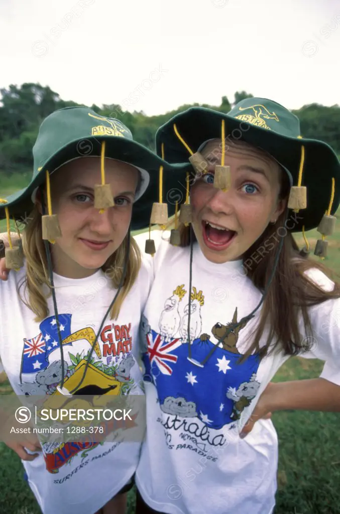 Portrait of two teenagers girls smiling, Australia