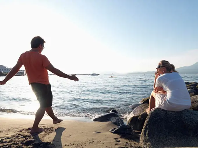 Mature couple enjoying on the beach, Vancouver, British Columbia, Canada