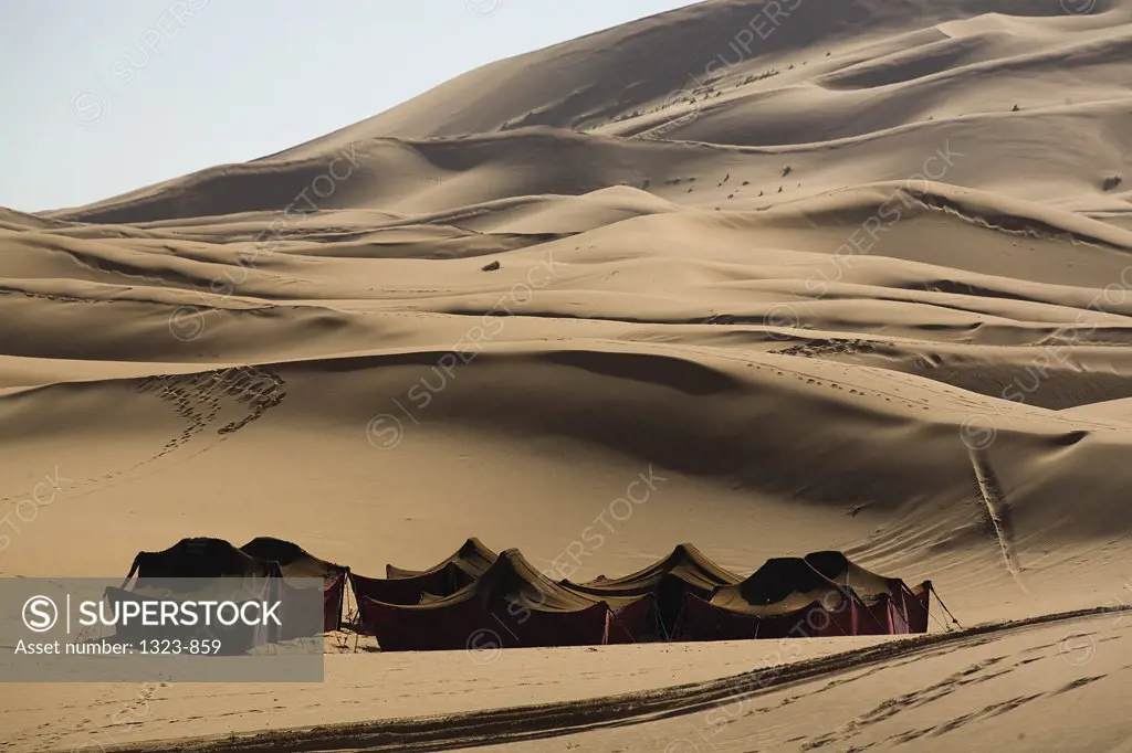 Beduin camping tents in a desert, Erg Chebbi Dunes, Sahara Desert, Morocco