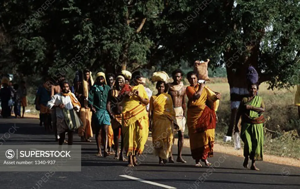 Pilgrims walking on a road, Palani Murugan Temple, Palani, Dindigul District, Tamil Nadu, India