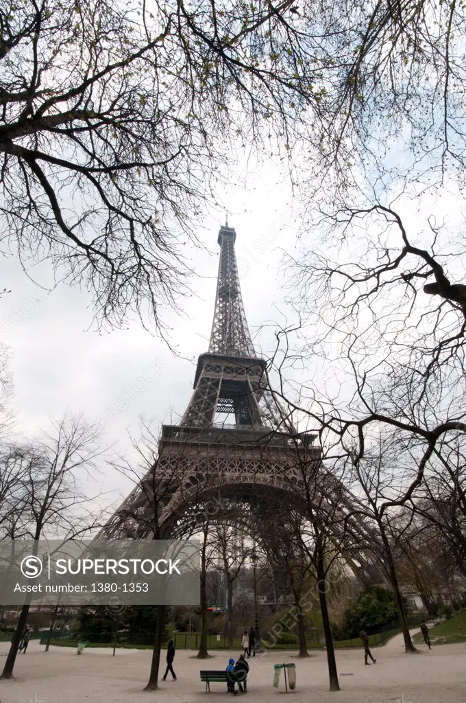 Trees in a park with a tower in the background, Eiffel Tower, Paris, Ile-de-France, France