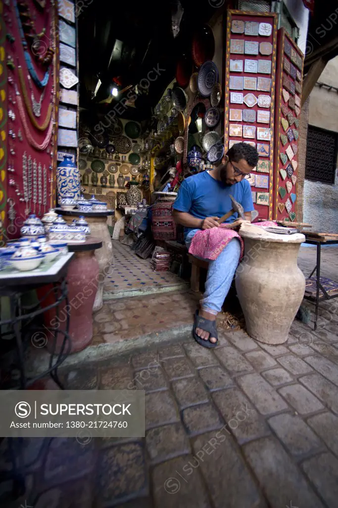 Man working in the market, Fez