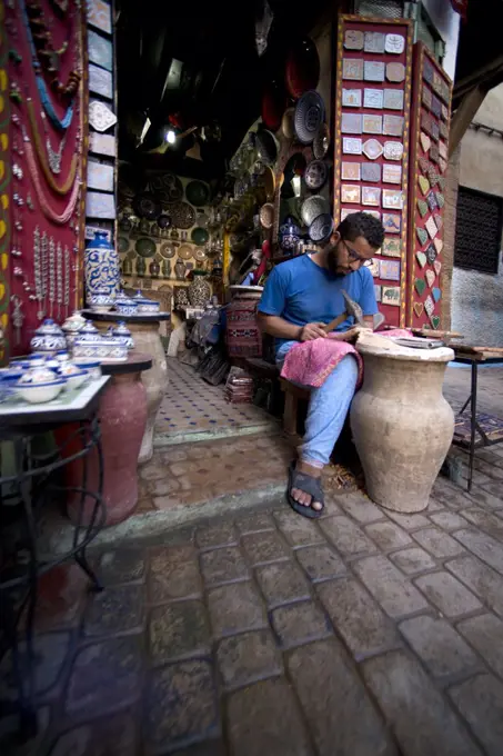 Man working in the market, Fez