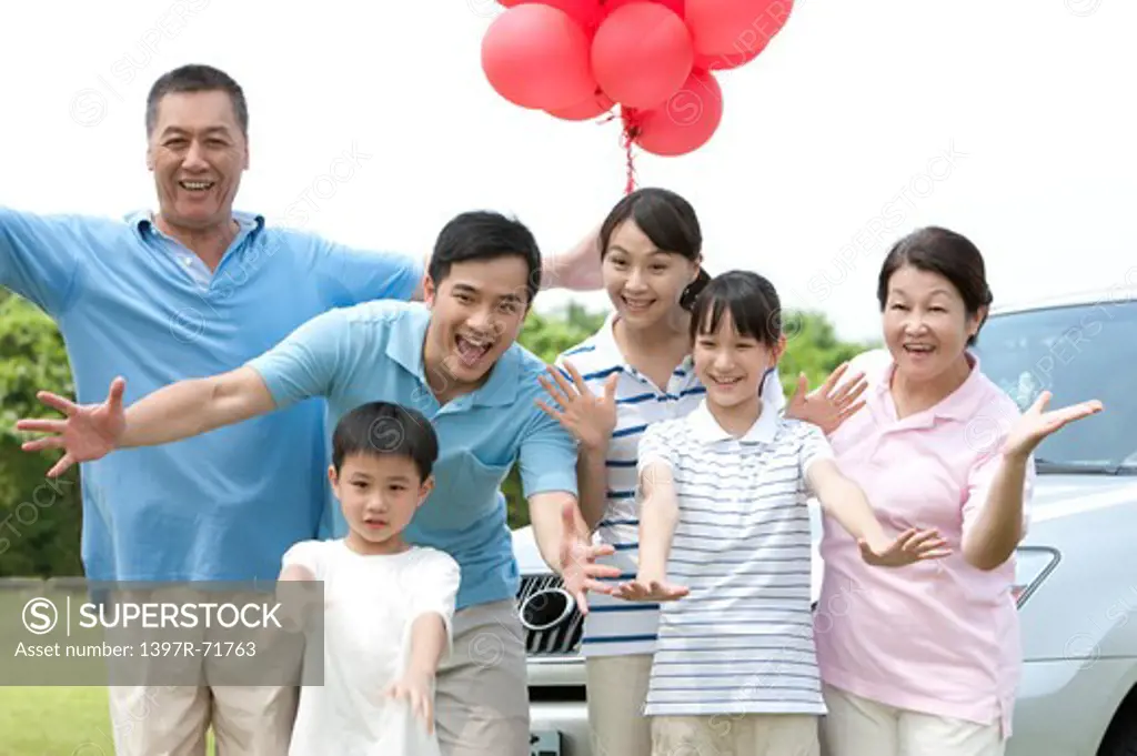 Multi-generational family expressing welcome