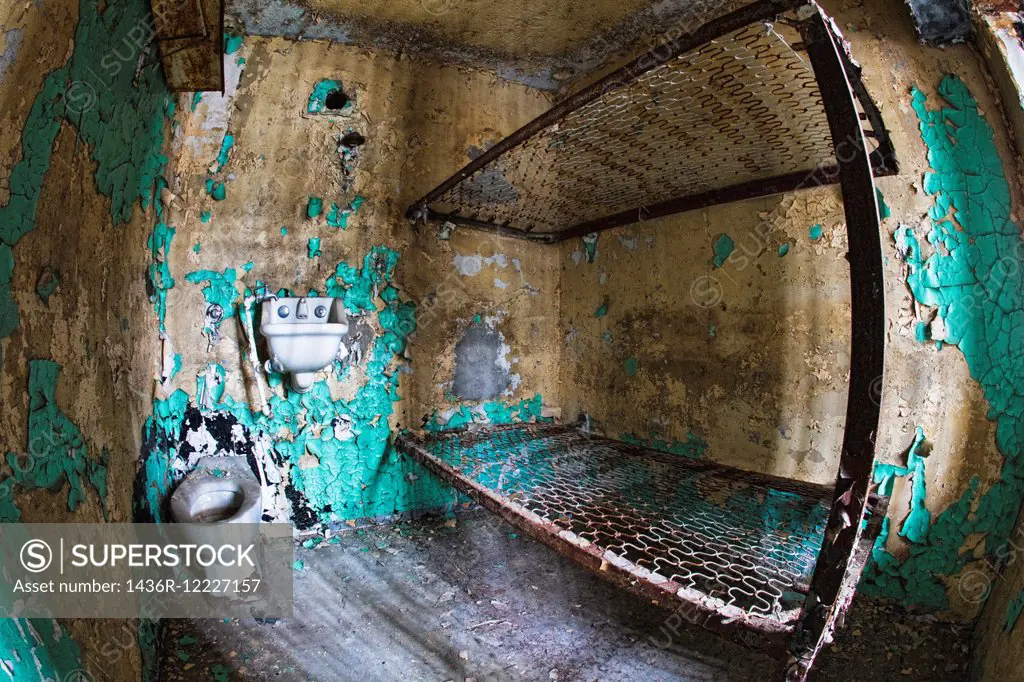 Cell block of the inside of an old prison no longer in use.