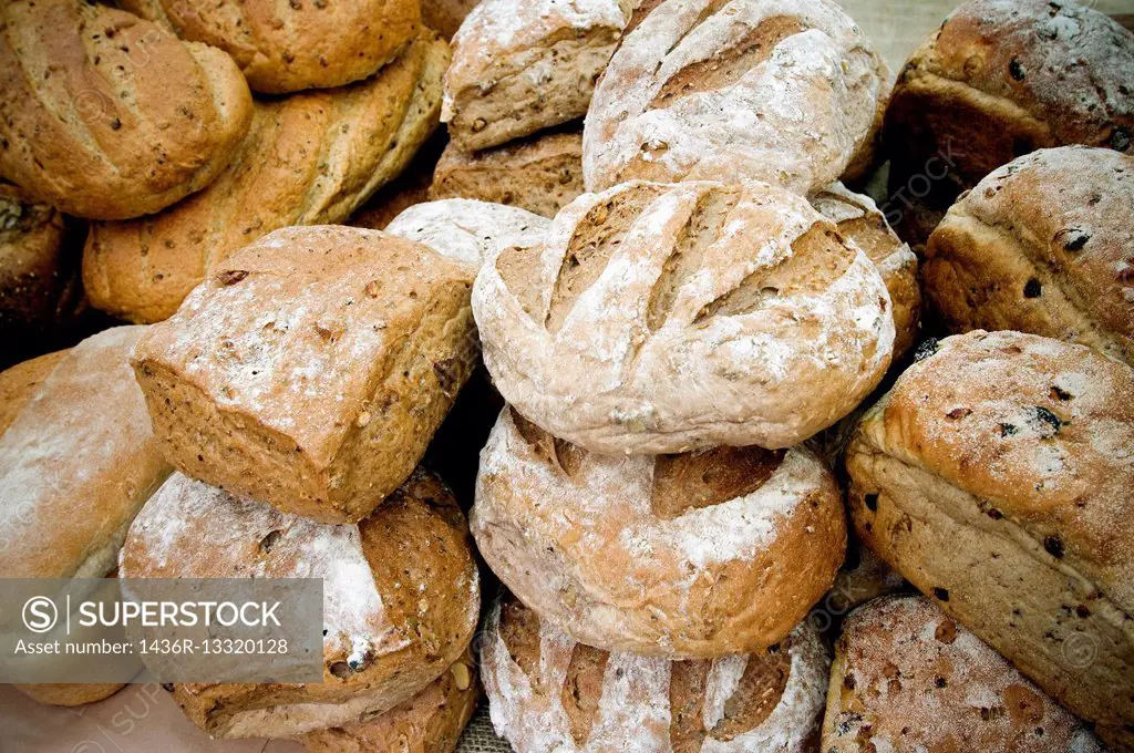 different types of bread in a bakery. Chapatas, Wholemeal bread, Organic, Seeded, Granary bread, Brioche.