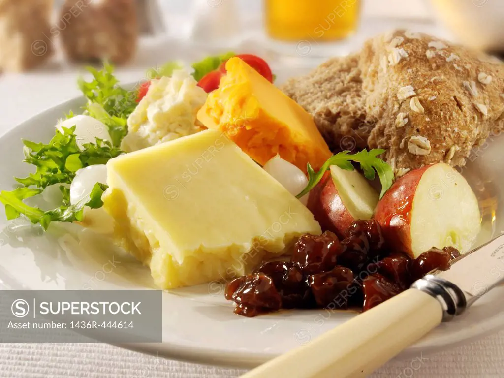 Traditional cheese Ploughman´s lunch with Cheddar, and Lancashire cheese photos