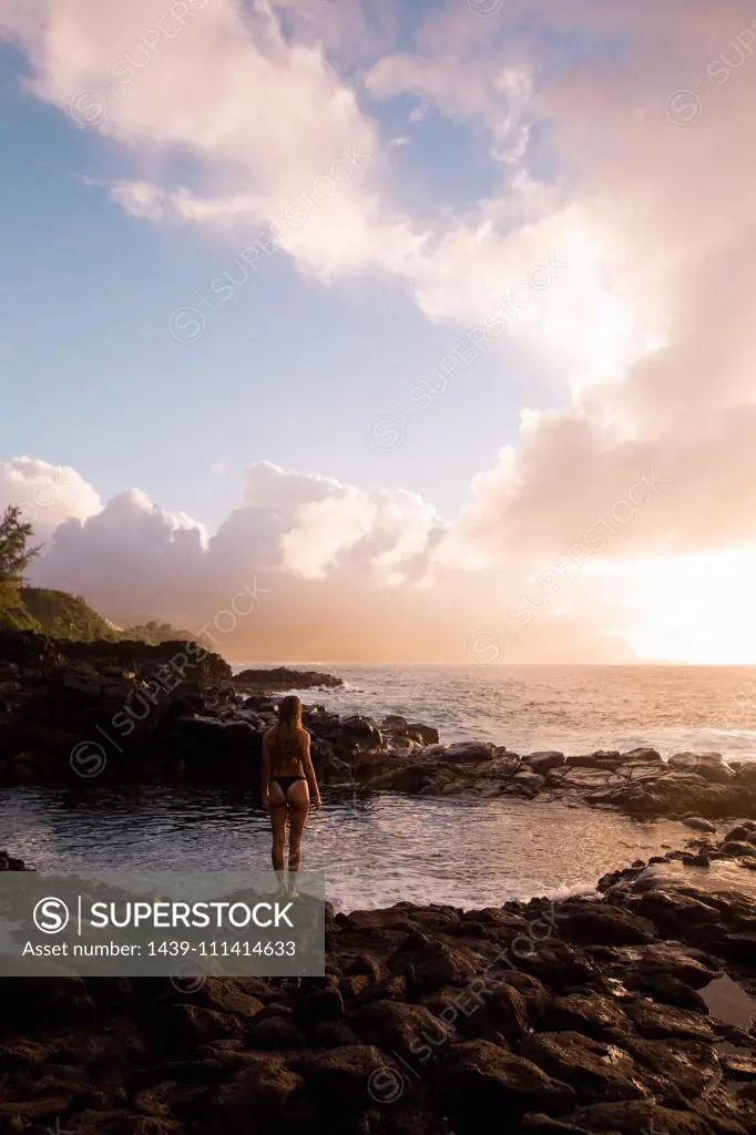 Swimmer enjoying enclosed sea pool, Princeville, Hawaii, US