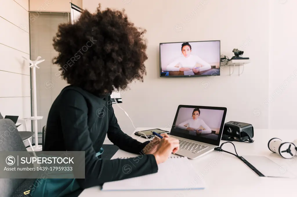 Businesswoman on video call in office