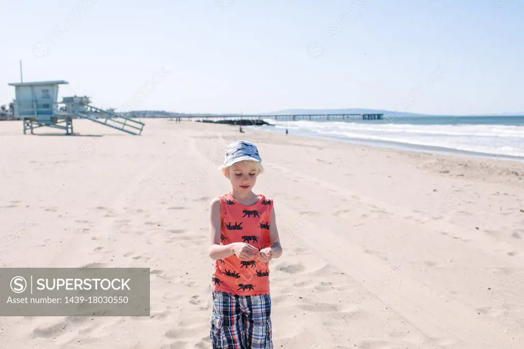 Boy on sandy beach