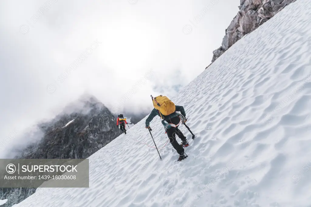 Climbers on Tantalus Traverse, a classic alpine traverse close to Squamish, British Columbia, Canada