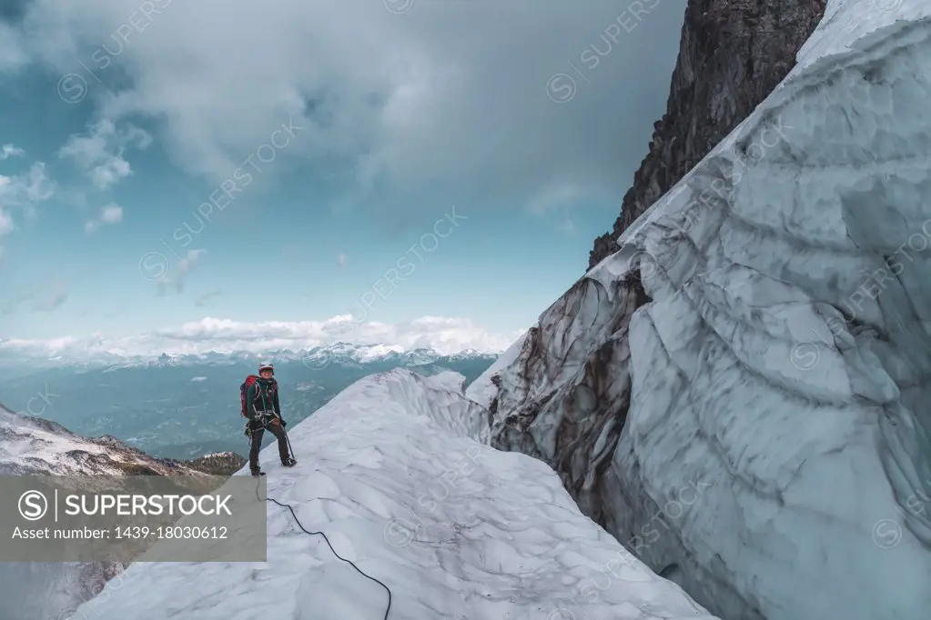 Climber on Tantalus Traverse, a classic alpine traverse close to Squamish, British Columbia, Canada