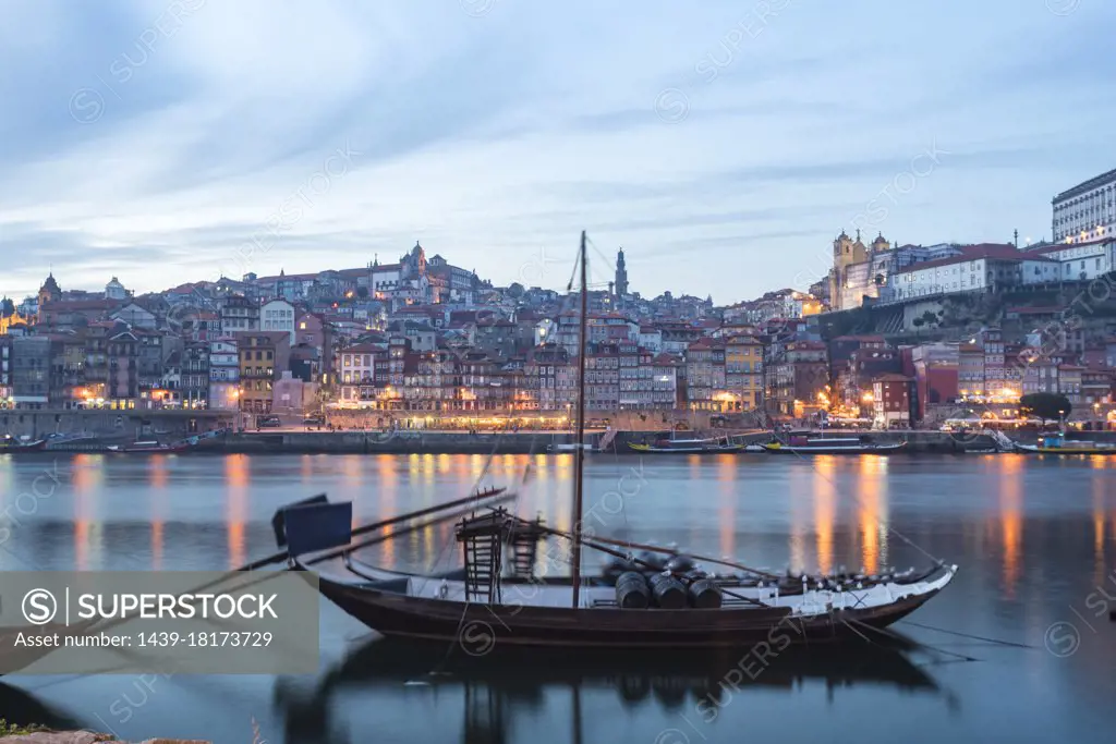 Portugal, Porto, Traditional rabelo boats on Douro river at dusk