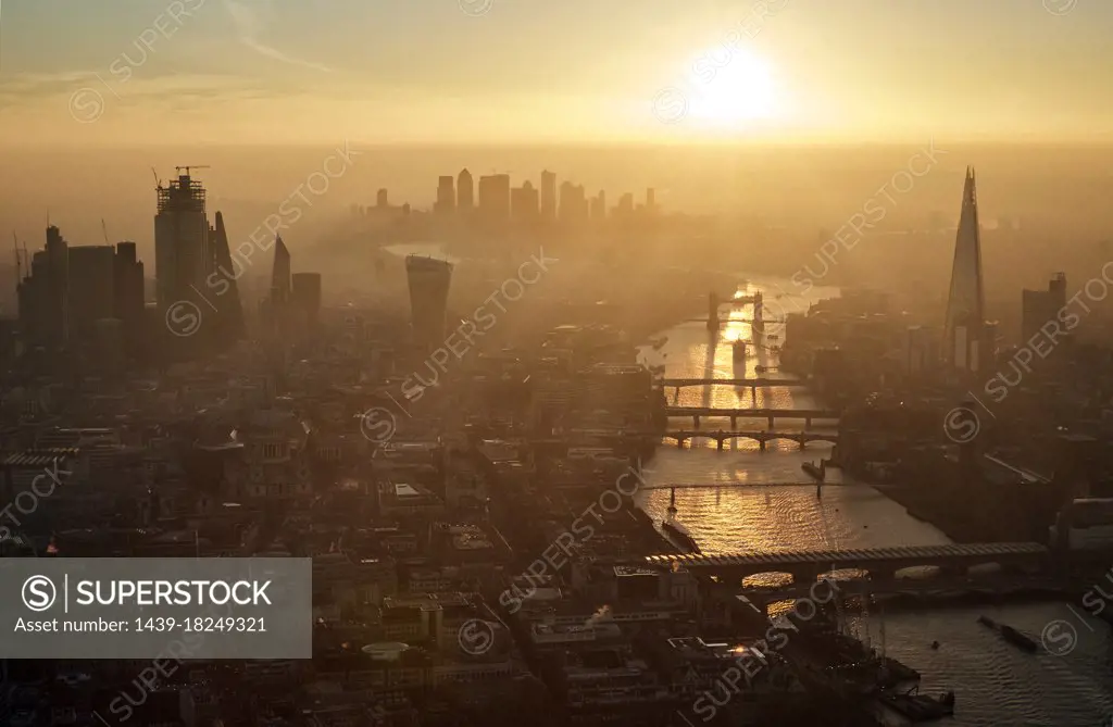 UK, London, Aerial view of city and Thames river at sunset