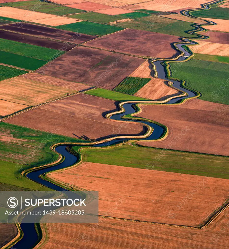 UK, Lytham St. Annes, Aerial view of river meandering through fields