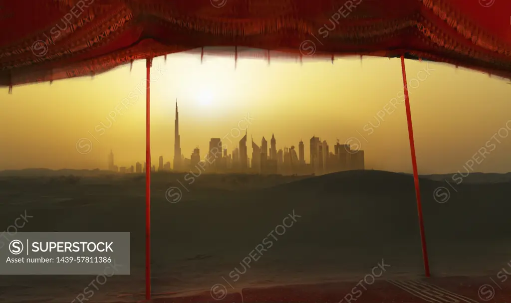 Futuristic cityscape from bedouin tent, Dubai, United Arab Emirates