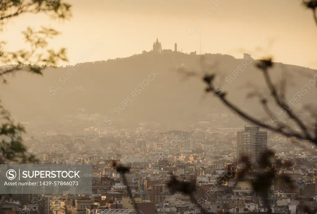 Elevated cityscape view to Tibidabo from Montjuic, Barcelona, Spain