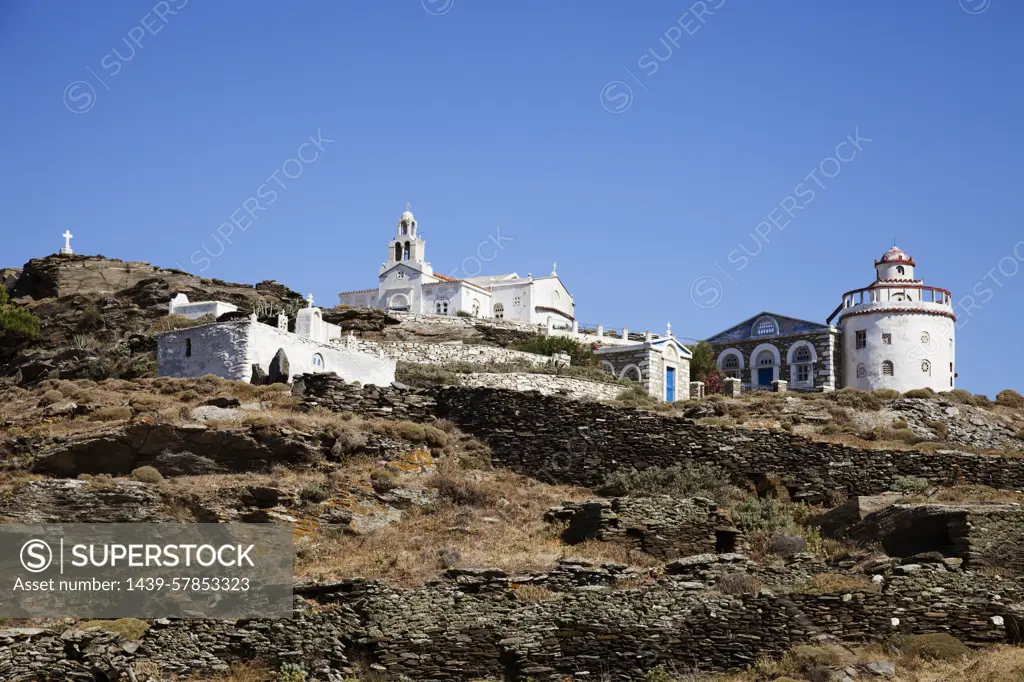 Whitewashed church on hill, Tinos Island, Greece