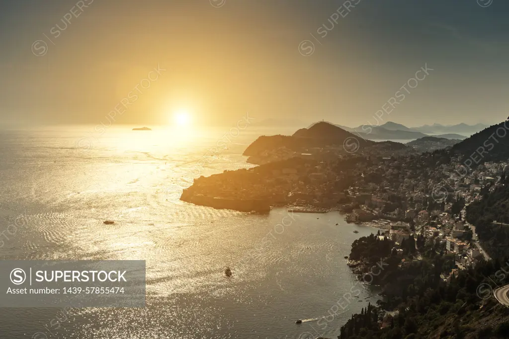 Mountains on coast by sea at sunset, Adamovec, Grad Zagreb, Croatia, Europe