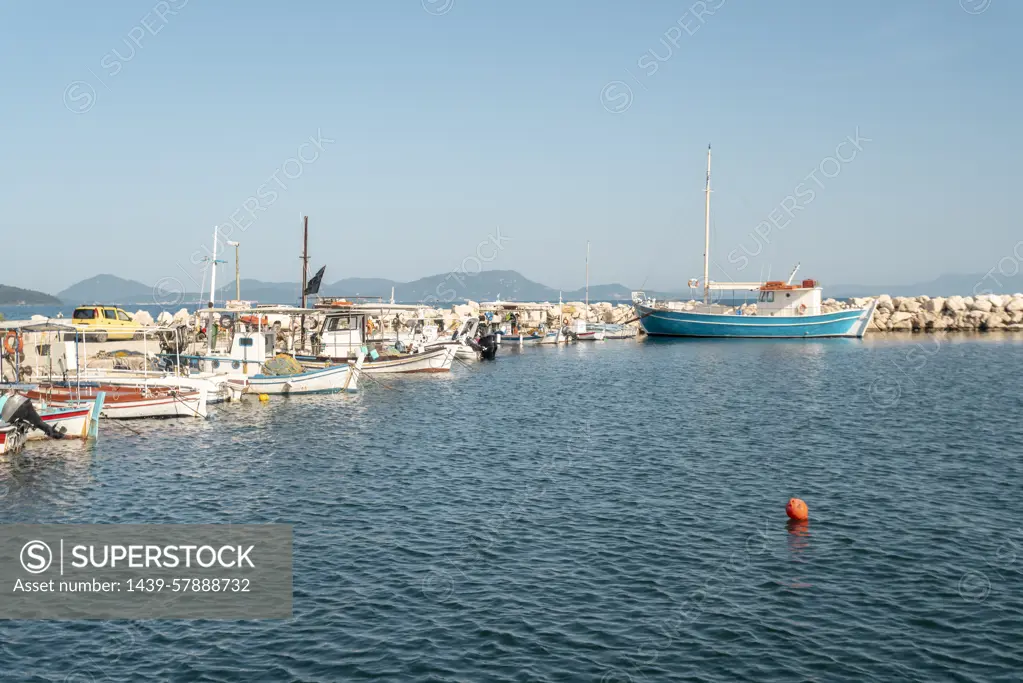 Greece, Lefkimmi, Boats moored in small harbor