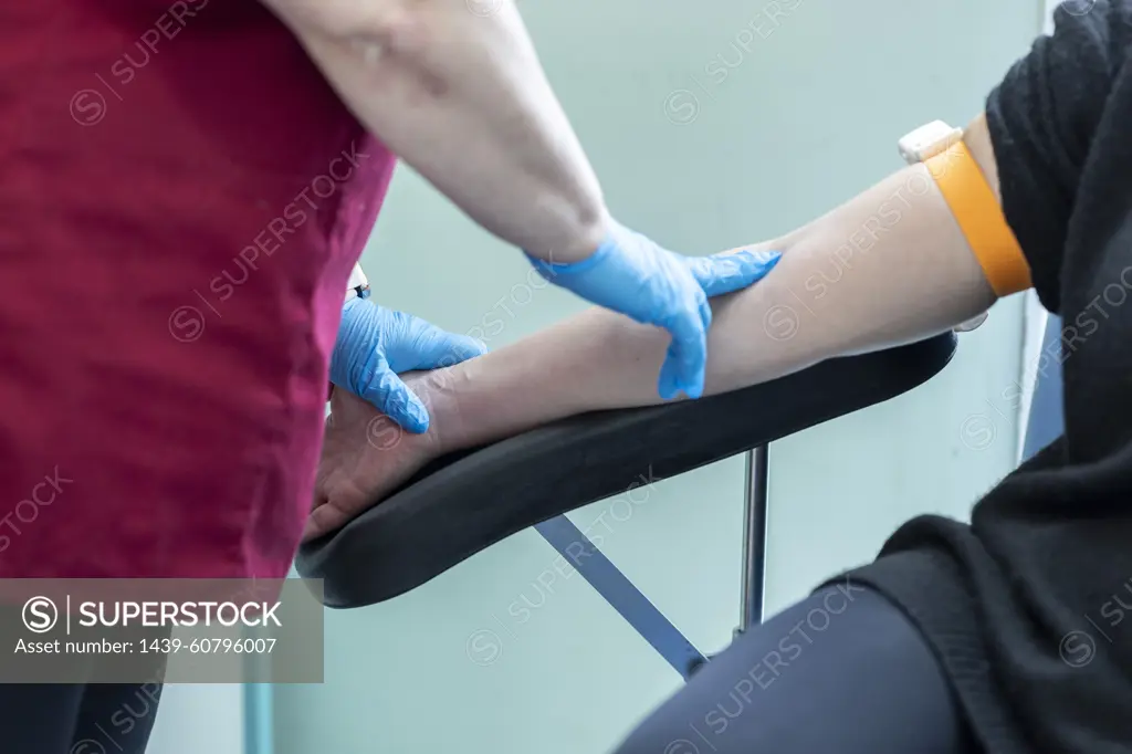 Blood drawn from arm for medical test