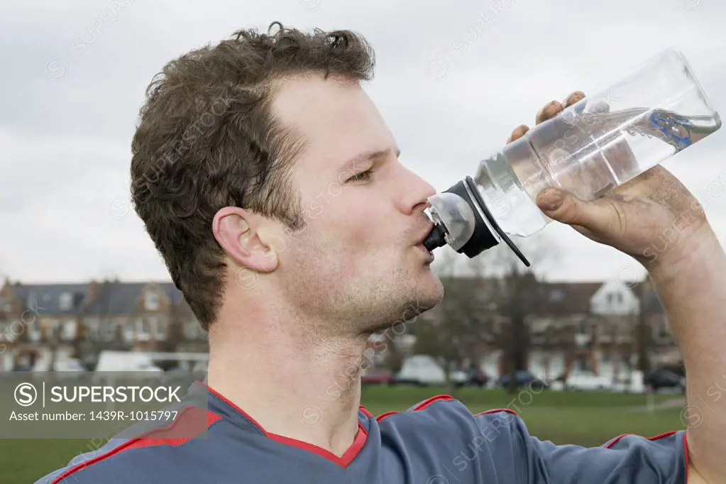 Footballer drinking water