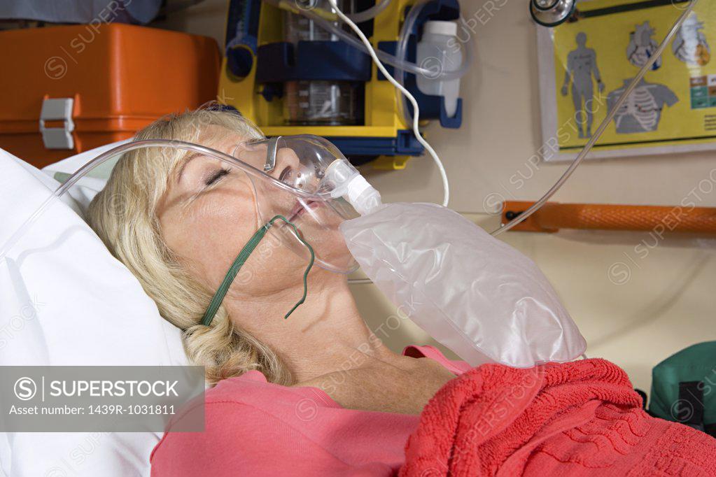 Woman Wearing Oxygen Mask Superstock