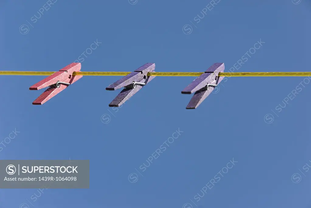 Pegs on a clothesline