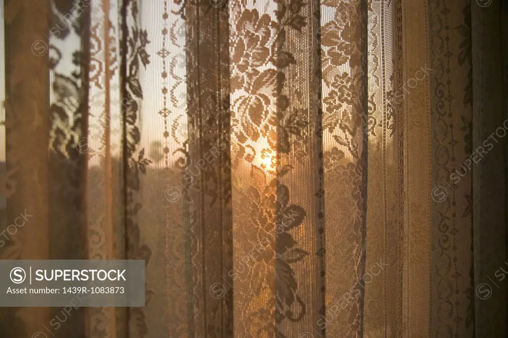 Sunlight through net curtain