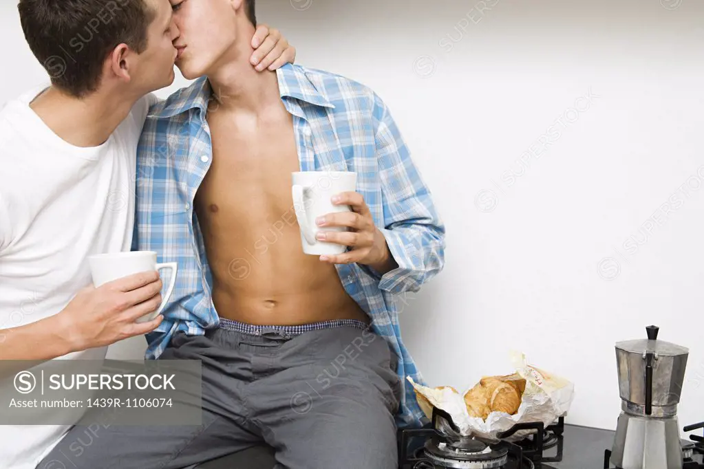 A gay couple kissing