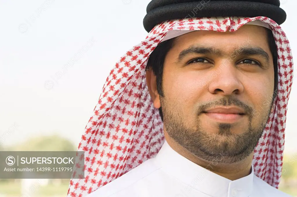 Portrait of a young man wearing a gutra