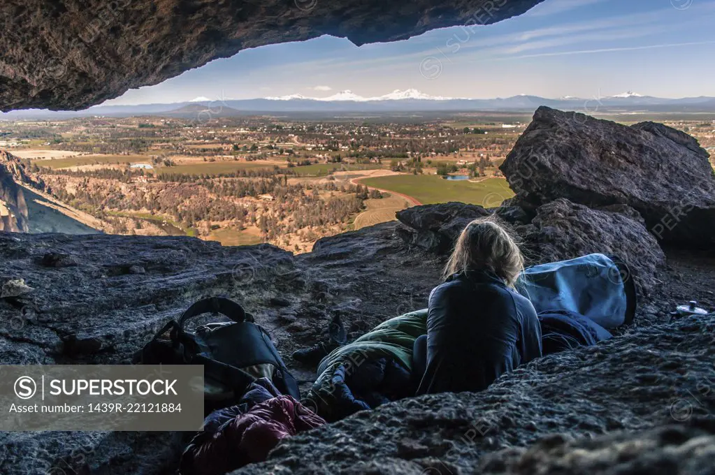 Rock climber on summit, Smith Rock State Park, Oregon, USA