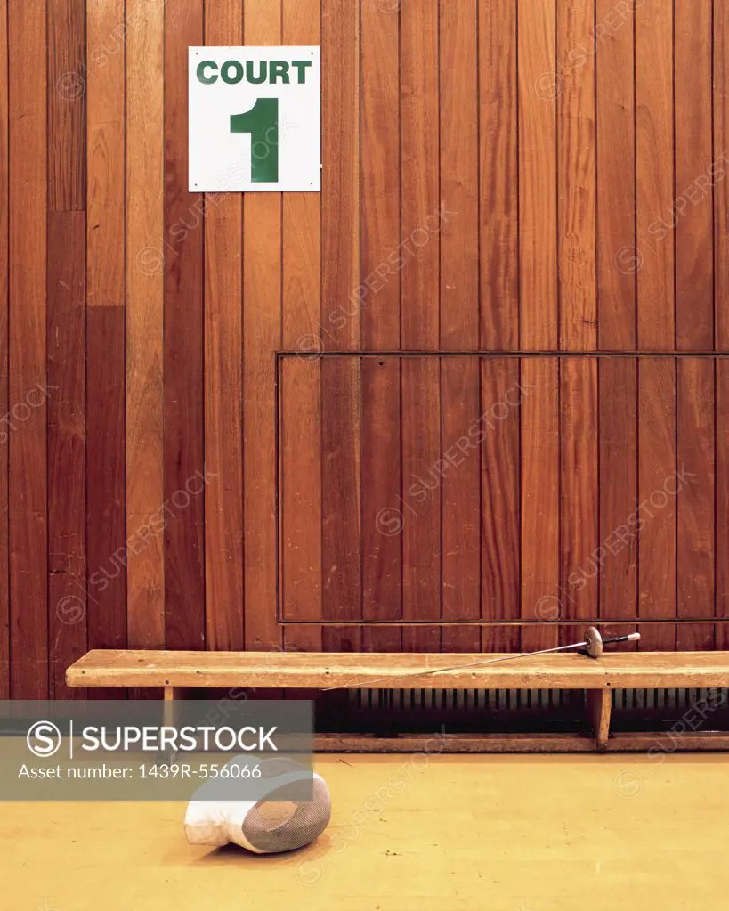 Fencing mask in sport court