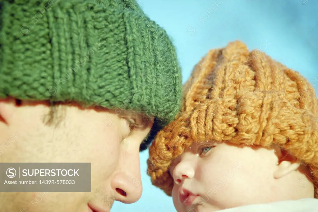 Dad with baby in woolie hats