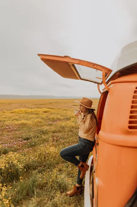 Woman on road trip in countryside