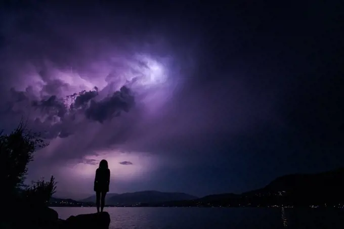 Storm in the Okanagan, woman in silhouette, British Columbia, Canada