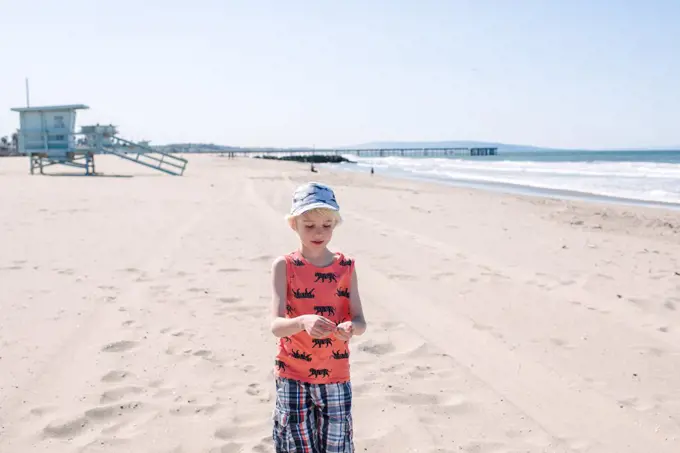 Boy on sandy beach