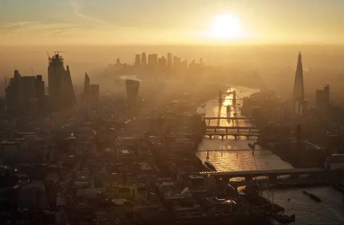 UK, London, Aerial view of city and Thames river at sunset