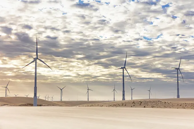 Wind turbines in desert landscape, Taiba, Ceara, Brazil